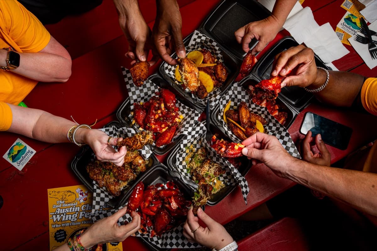 A vendor booth serving wings
