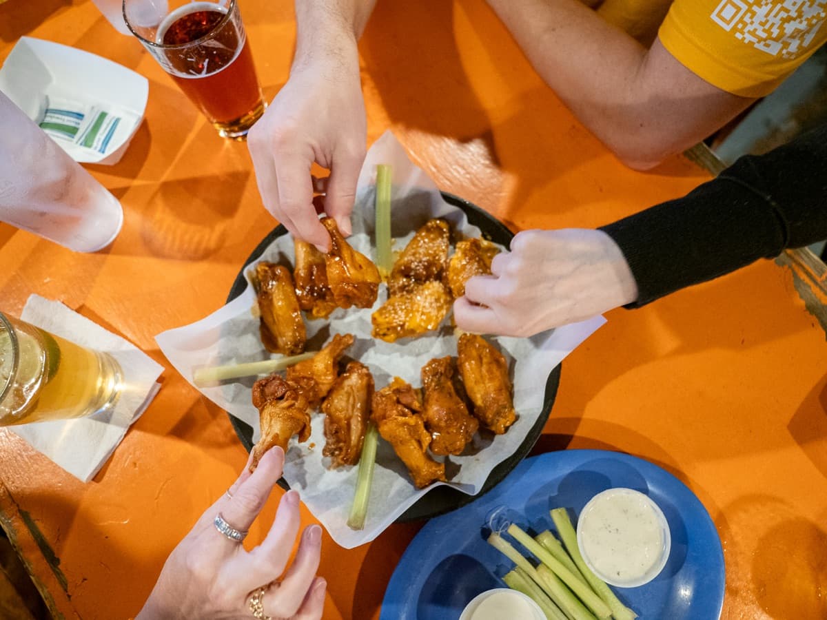 Crowd enjoying wings at the Austin Chicken Wing Festival